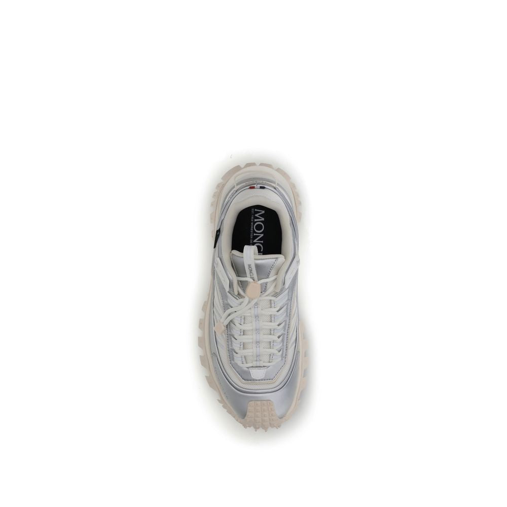 Cream Calf Leather Bos Taurus Athletic SneakersThe Moncler Trailgrip GTX low-top Sneakers combine technical performance and contemporary style. Crafted from fabric and leather with reflective inserts, they feature a logo print on the back and an embossed