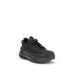 Black Calf Leather Bos Taurus Athletic SneakersThe Moncler Trailgrip GTX low-top Sneakers combine technical performance and contemporary style. Crafted from fabric and leather with reflective inserts, they feature a logo print on the back and an embossed