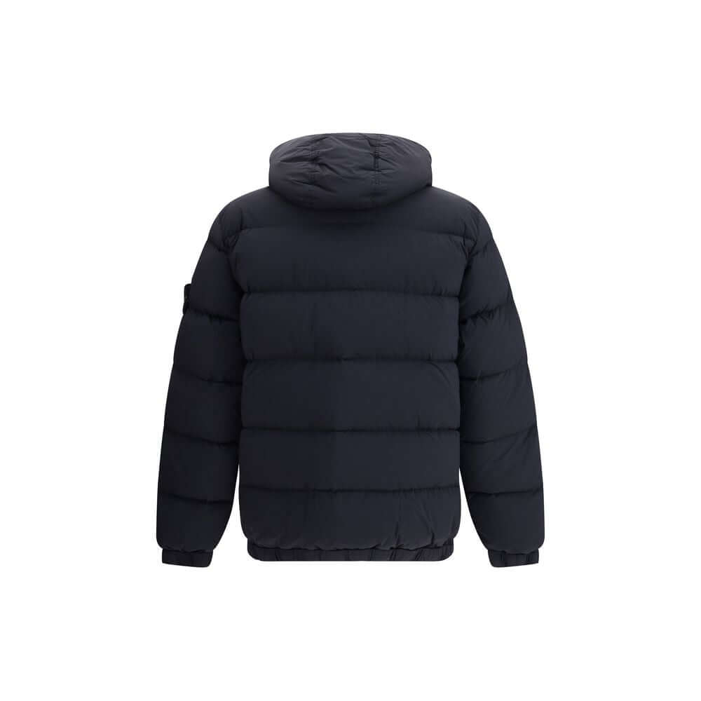 Black Polyamide CoatStone Island’s hooded Down Jacket is made of lightweight, garment-dyed nylon with anti-drip treatment. Featuring a padded hood with horizontal drawstring, it has vertical pockets with contrasting webbing flap, herringbone pattern with