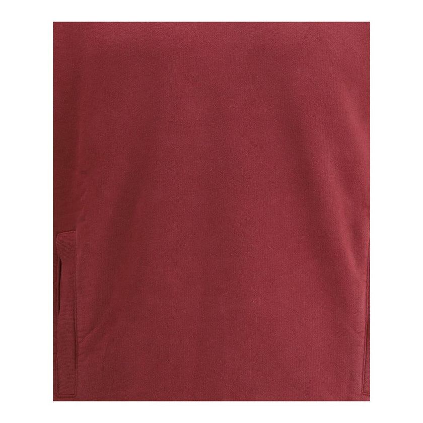 Hoodie with logo compassThe Hoodie by Stone Island combines functionality and iconic style. Featuring an adjustable drawstring hood, it has a regular fit and two practical side welt pockets. The ribbed cuffs and straight hem ensure comfort and a snug fit,