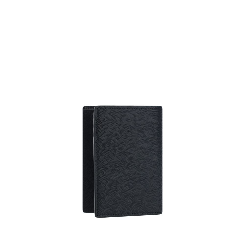 Black Calf Leather Bos Taurus WalletCalfskin Embossed Wallet by Saint Laurent, billfold design, made of grained leather, iconic brand print on front, bill compartment, card slots and rectangular pattern. Season: AW25 Dimension: 9x9x2 Composition: 100% Cal