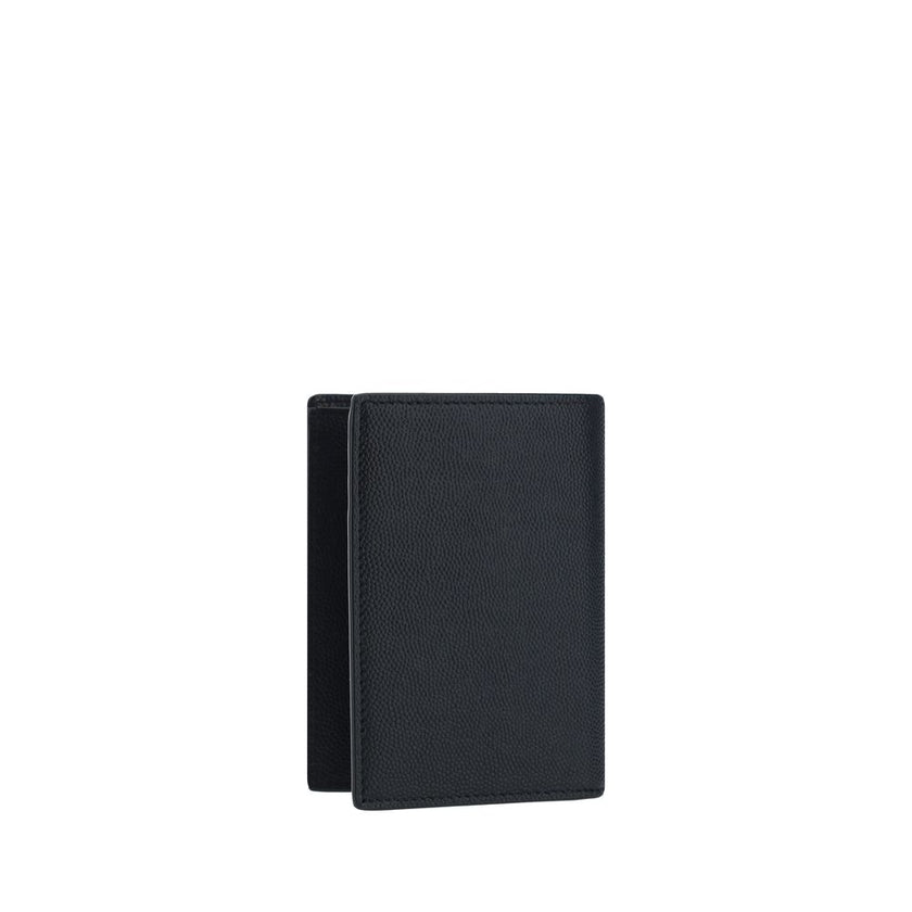 Black Calf Leather Bos Taurus WalletCalfskin Embossed Wallet by Saint Laurent, billfold design, made of grained leather, iconic brand print on front, bill compartment, card slots and rectangular pattern. Season: AW25 Dimension: 9x9x2 Composition: 100% Cal