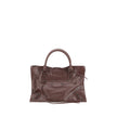 Brown Calf Leather Bos Taurus Shoulder BagBalenciaga’s Le City Medium Shoulder Bag is a high-class item made of fine lambskin leather that combines elegance and functionality. The two hand-woven leather handles lend an artisanal and refined touch, while t