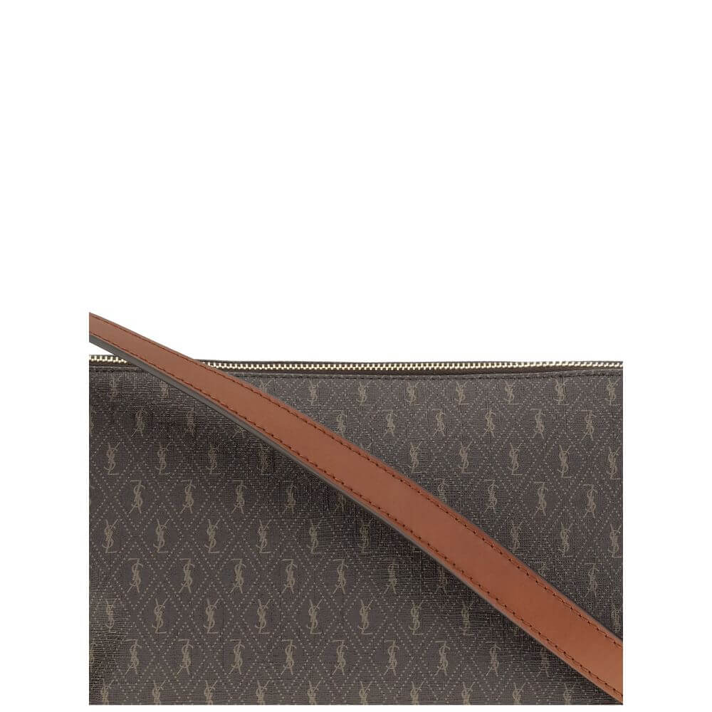 Brown Leather Shoulder BagThe Saint Laurent Monogram Shoulder Bag is the perfect balance between iconic elegance and functionality. Crafted with attention to detail, it features a shoulder strap embellished with a buckle engraved with the Saint Laurent Pa