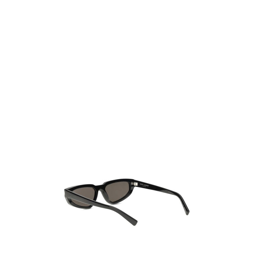Black Acetate SunglassesThe 634 Nova Sunglasses by Saint Laurent stand out for their elongated acetate frame, which gives them a bold and contemporary look. The nylon lenses ensure lightness and protection, making this model a sophisticated and functional