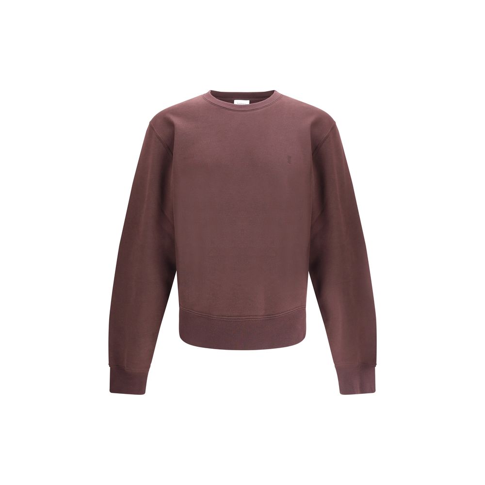 Bordeaux Cotton SweatshirtSaint Laurent’s Cassandre Sweatshirt is a garment with an essential and elegant style. Made with a crew neck and long sleeves, it features ribbed trim and a tone-on-tone Cassandre embroidery on the chest, a discreet but iconic de
