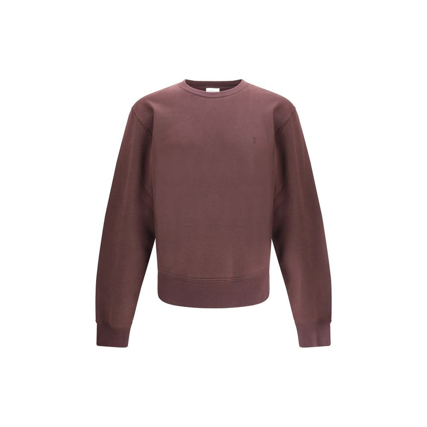 Bordeaux Cotton SweatshirtSaint Laurent’s Cassandre Sweatshirt is a garment with an essential and elegant style. Made with a crew neck and long sleeves, it features ribbed trim and a tone-on-tone Cassandre embroidery on the chest, a discreet but iconic de