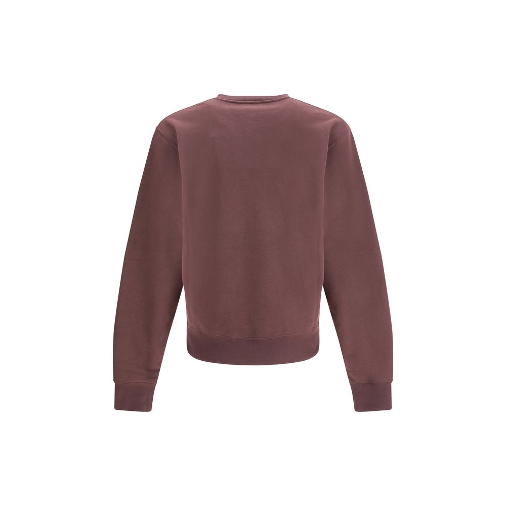 Bordeaux Cotton SweatshirtSaint Laurent’s Cassandre Sweatshirt is a garment with an essential and elegant style. Made with a crew neck and long sleeves, it features ribbed trim and a tone-on-tone Cassandre embroidery on the chest, a discreet but iconic de