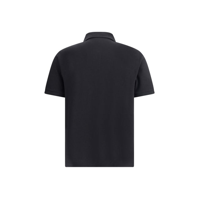 Black Cotton Polo ShirtSaint Laurent’s cotton polo Shirt is an essential piece with a classic and refined design. Featuring a traditional collar and a tone-on-tone three-button front placket, it has short sleeves and a regular fit for comfort. The embroid