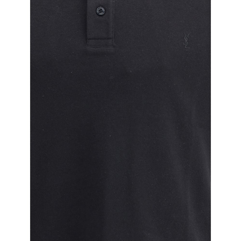 Black Cotton Polo ShirtSaint Laurent’s cotton polo Shirt is an essential piece with a classic and refined design. Featuring a traditional collar and a tone-on-tone three-button front placket, it has short sleeves and a regular fit for comfort. The embroid