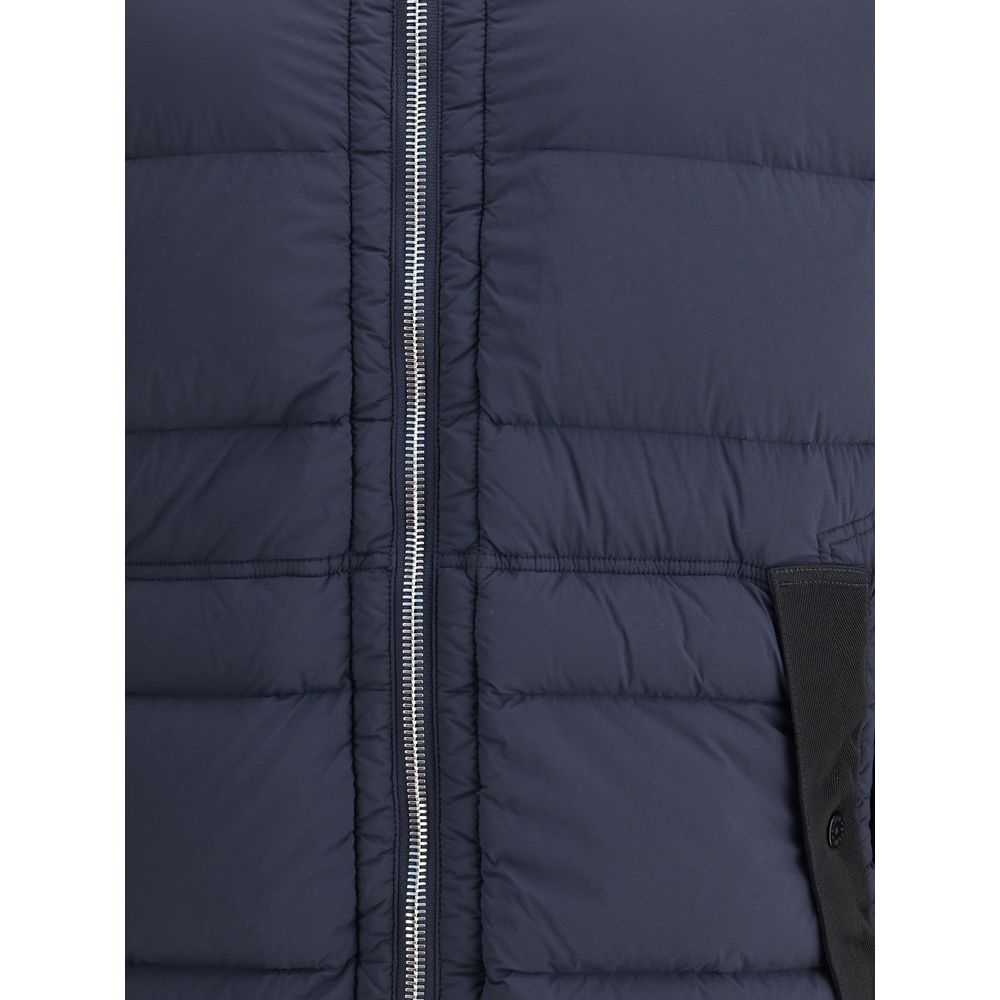 Blue Polyamide Full-Length JacketStone Island’s hooded Down Jacket is made of lightweight, garment-dyed nylon with anti-drip treatment. Featuring a padded hood with horizontal drawstring, it has vertical pockets with contrasting webbing flap, herringbone