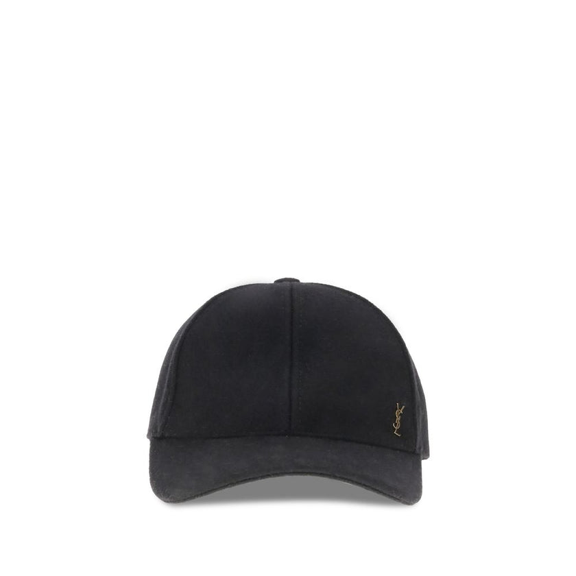 Wool Baseball CapSaint Laurent’s wool baseball Cap combines sportiness and iconic style. Made of soft wool, it features a classic silhouette with an adjustable back for a customized fit. On the front, the applied YSL plaque lends a distinctive and sophist