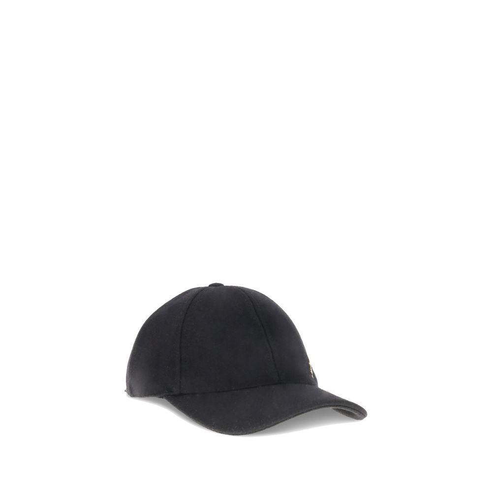Wool Baseball CapSaint Laurent’s wool baseball Cap combines sportiness and iconic style. Made of soft wool, it features a classic silhouette with an adjustable back for a customized fit. On the front, the applied YSL plaque lends a distinctive and sophist