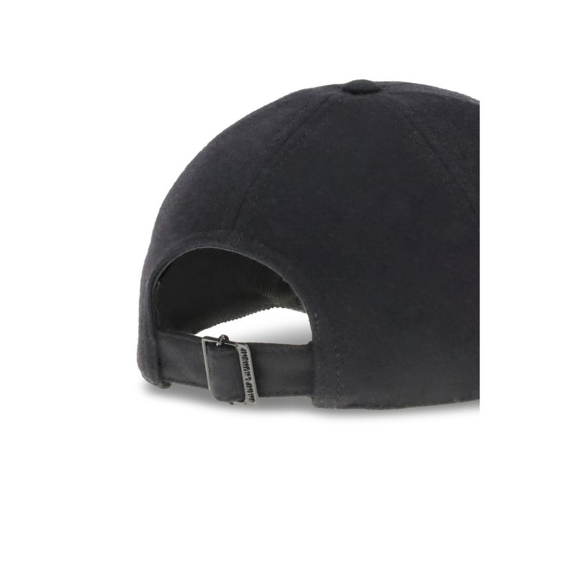 Wool Baseball CapSaint Laurent’s wool baseball Cap combines sportiness and iconic style. Made of soft wool, it features a classic silhouette with an adjustable back for a customized fit. On the front, the applied YSL plaque lends a distinctive and sophist