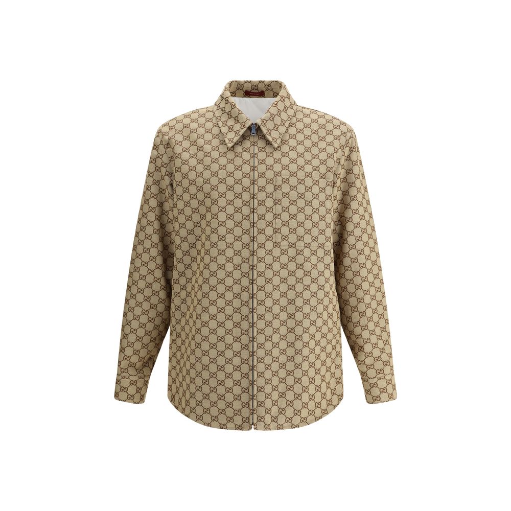 Brown Cotton Jackets And CoatThe Gucci cotton Jacket is a refined and modern piece, perfect for a casual-chic look. The shirt style offers a versatile fit, while the classic collar adds a touch of elegance. The front zip closure ensures practicality and a