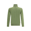 Green Wool TurtleneckSaint Laurent’s turtleneck Sweater is an essential garment with timeless appeal. Carefully crafted, it features a high ribbed collar that lends elegance and warmth, while a ribbed hem and cuffs ensure a snug and comfortable fit. A ver