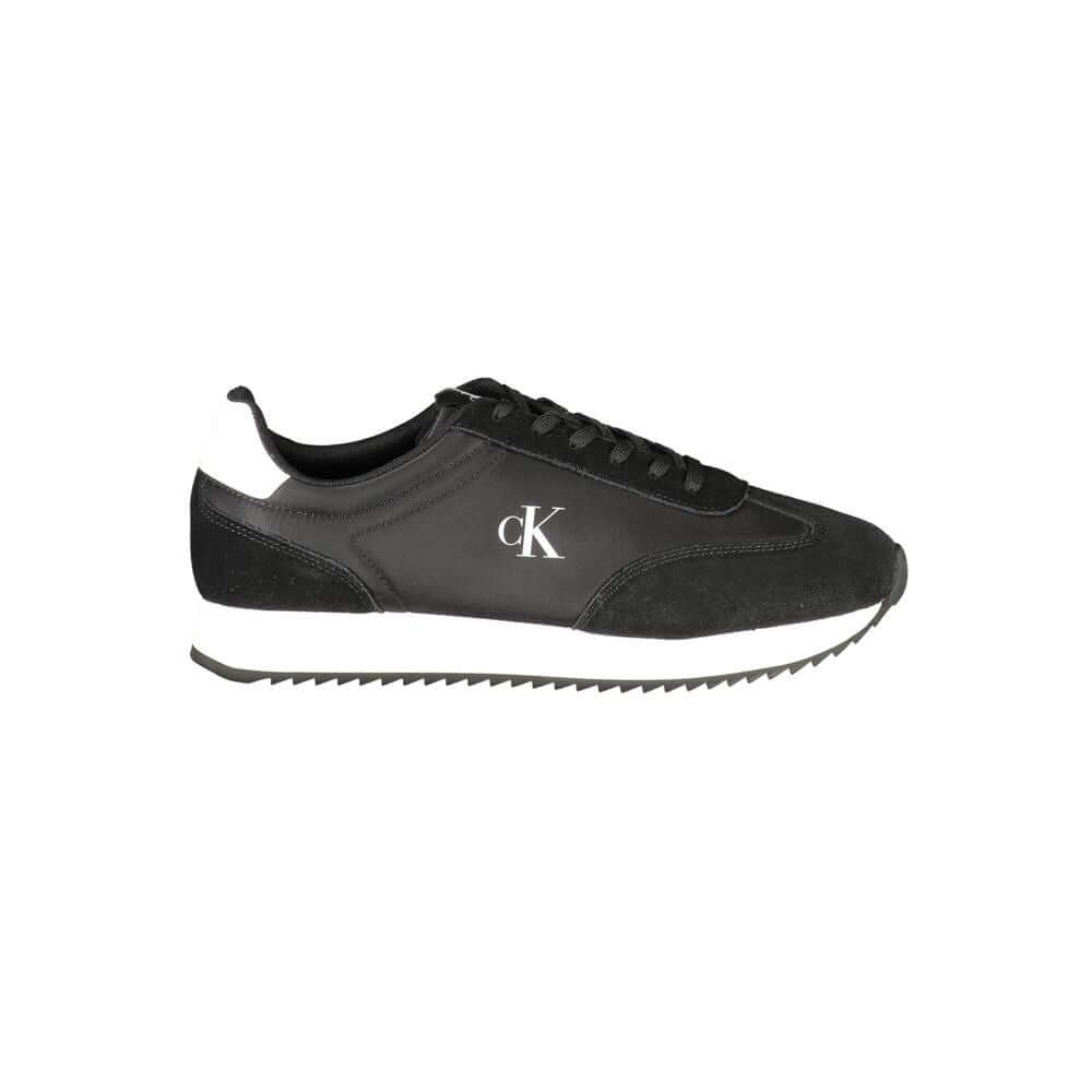 Black Leather Men SneakerStep out in sleek style with the Calvin Klein sports shoe, a nod to refined athleticism with an edge. Designed to make a statement as you stride, these kicks feature a sharp black base complemented by bold, contrasting white accen