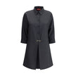 Gray Wool Casual DressGucci’s chemisier short Dress is an elegant and versatile garment made from high-quality wool. Featuring front buttons and three-quarter buttoned sleeves, it has a classic collar that echoes the traditional shirt style. The front ple