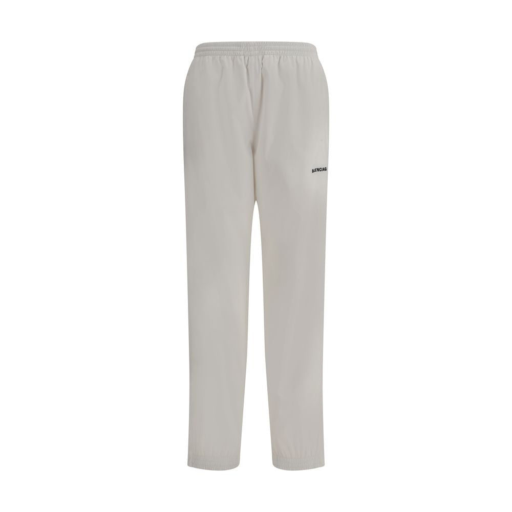 White Polyester Joggers (Workout Pants)Balenciaga’s Sweatpants combine comfort and contemporary style in an essential yet distinctive design. Featuring an elasticized waist and bottom, they feature two side welt pockets and a stitched logo on the front th