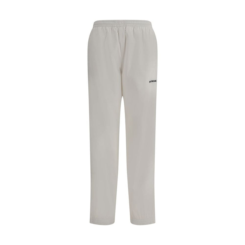 White Polyester Joggers (Workout Pants)Balenciaga’s Sweatpants combine comfort and contemporary style in an essential yet distinctive design. Featuring an elasticized waist and bottom, they feature two side welt pockets and a stitched logo on the front th