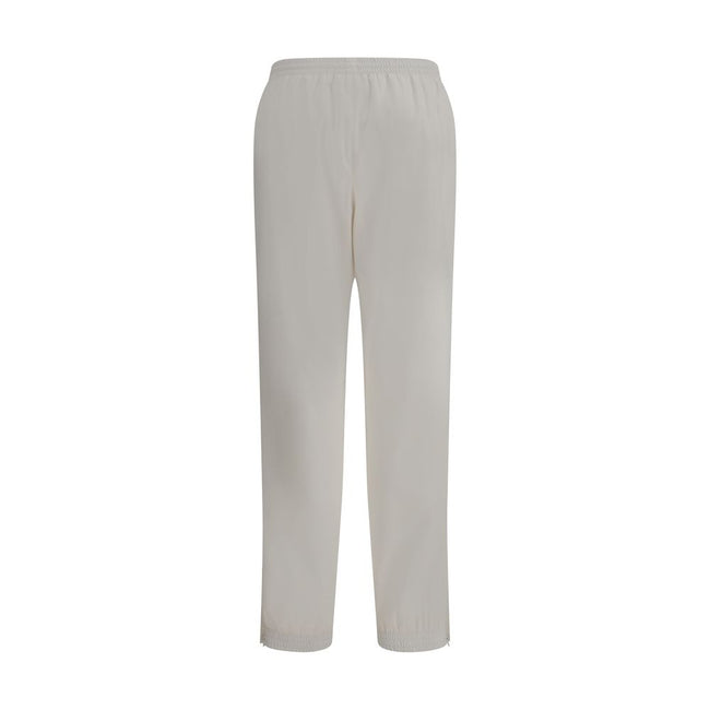 White Polyester Joggers (Workout Pants)Balenciaga’s Sweatpants combine comfort and contemporary style in an essential yet distinctive design. Featuring an elasticized waist and bottom, they feature two side welt pockets and a stitched logo on the front th