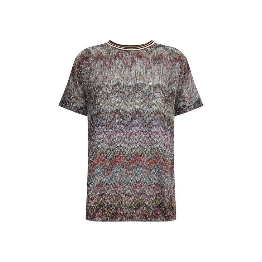 Zig zag T-ShirtMissoni’s sequined zig zag T-Shirt is a bright and refined garment made with Caperdoni’s exclusive loom work. The Maison’s classic zig zag pattern is enriched with lamé filaments and sequins, creating a bright and sophisticated effect. Made