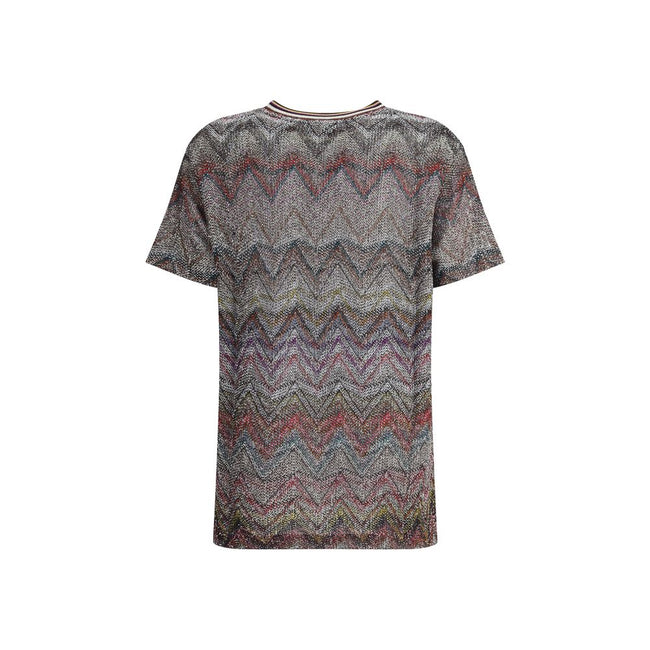 Zig zag T-ShirtMissoni’s sequined zig zag T-Shirt is a bright and refined garment made with Caperdoni’s exclusive loom work. The Maison’s classic zig zag pattern is enriched with lamé filaments and sequins, creating a bright and sophisticated effect. Made