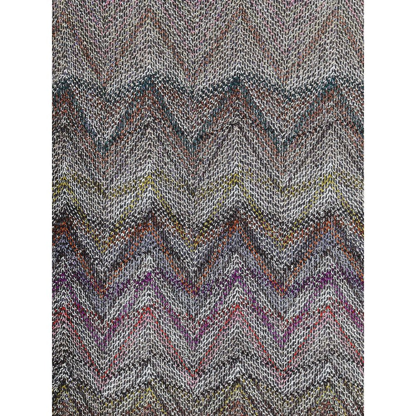 Zig zag T-ShirtMissoni’s sequined zig zag T-Shirt is a bright and refined garment made with Caperdoni’s exclusive loom work. The Maison’s classic zig zag pattern is enriched with lamé filaments and sequins, creating a bright and sophisticated effect. Made