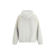 White Cotton SweatshirtBalenciaga’s City of Angels Hoodie combines comfort and urban identity in an essential yet striking design. Made of dry fleece, it features sloping shoulders, front pouch pocket and gathered trim on cuffs and waist. The drawstring-f