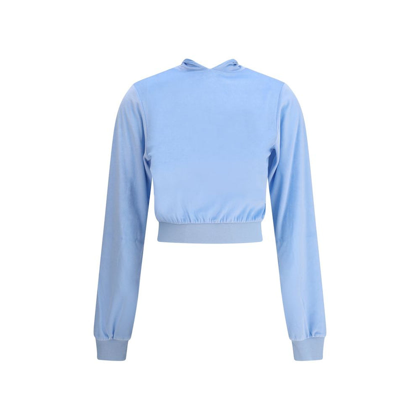 Light Blue Triacetate TopBalenciaga’s Back To Front Top reinterprets the rules of design with a bold and sophisticated inverted construction. Made of bistretch velvet, it features sloping shoulders and a silhouette that plays with volumes. The back, the s