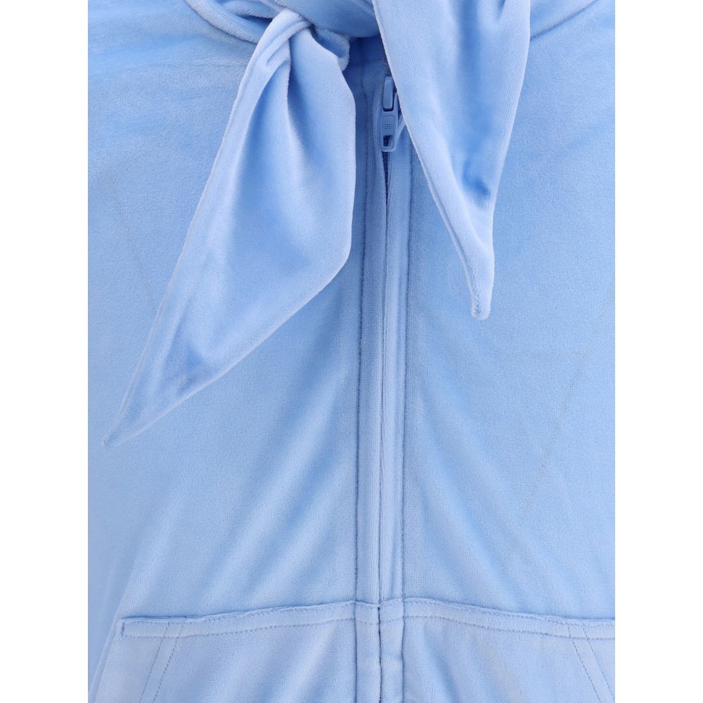 Light Blue Triacetate TopBalenciaga’s Back To Front Top reinterprets the rules of design with a bold and sophisticated inverted construction. Made of bistretch velvet, it features sloping shoulders and a silhouette that plays with volumes. The back, the s