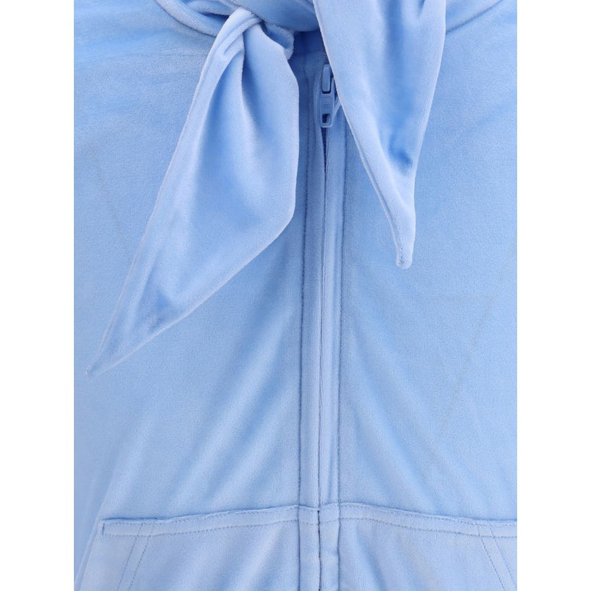 Light Blue Triacetate TopBalenciaga’s Back To Front Top reinterprets the rules of design with a bold and sophisticated inverted construction. Made of bistretch velvet, it features sloping shoulders and a silhouette that plays with volumes. The back, the s