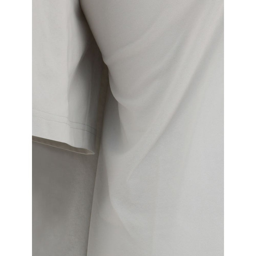 White Cotton Casual DressBalenciaga’s dry jersey T-shirt Dress combines essential lines with a novel tailoring construction. Made of dry jersey, it offers a semi-fitted fit: more defined at the front and soft at the back for a dynamic and sophisticated ef