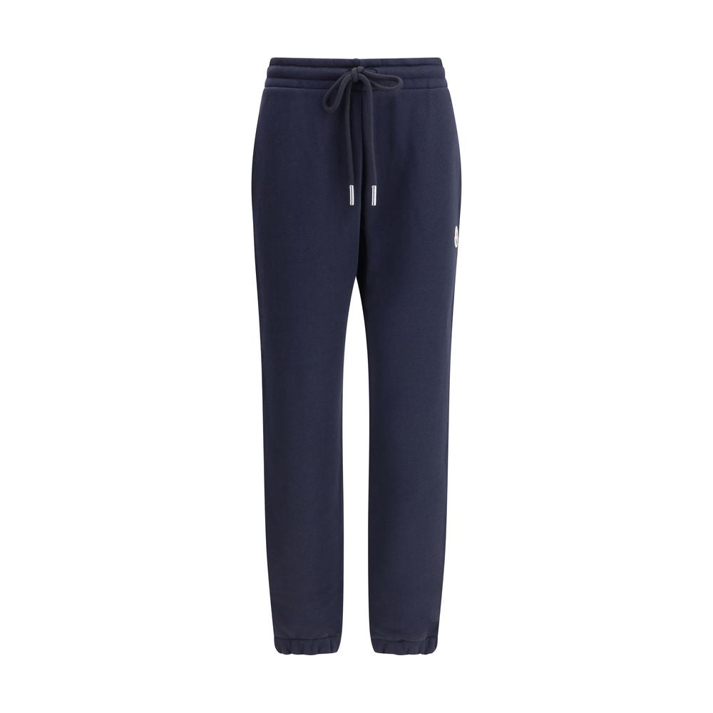 Blue Cotton Joggers (Workout Pants)Made from a soft cotton blend, Moncler’s Sweatpants combine comfort and sporty style. Featuring an elastic waistband with drawstring, inseam pockets and elastic cuffs, they are enhanced by a contrasting logo applique on