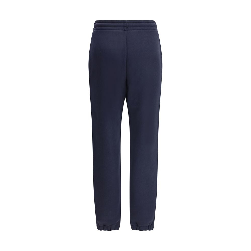 Blue Cotton Joggers (Workout Pants)Made from a soft cotton blend, Moncler’s Sweatpants combine comfort and sporty style. Featuring an elastic waistband with drawstring, inseam pockets and elastic cuffs, they are enhanced by a contrasting logo applique on