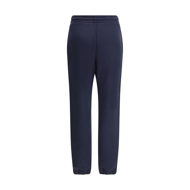 Blue Cotton Joggers (Workout Pants)Made from a soft cotton blend, Moncler’s Sweatpants combine comfort and sporty style. Featuring an elastic waistband with drawstring, inseam pockets and elastic cuffs, they are enhanced by a contrasting logo applique on
