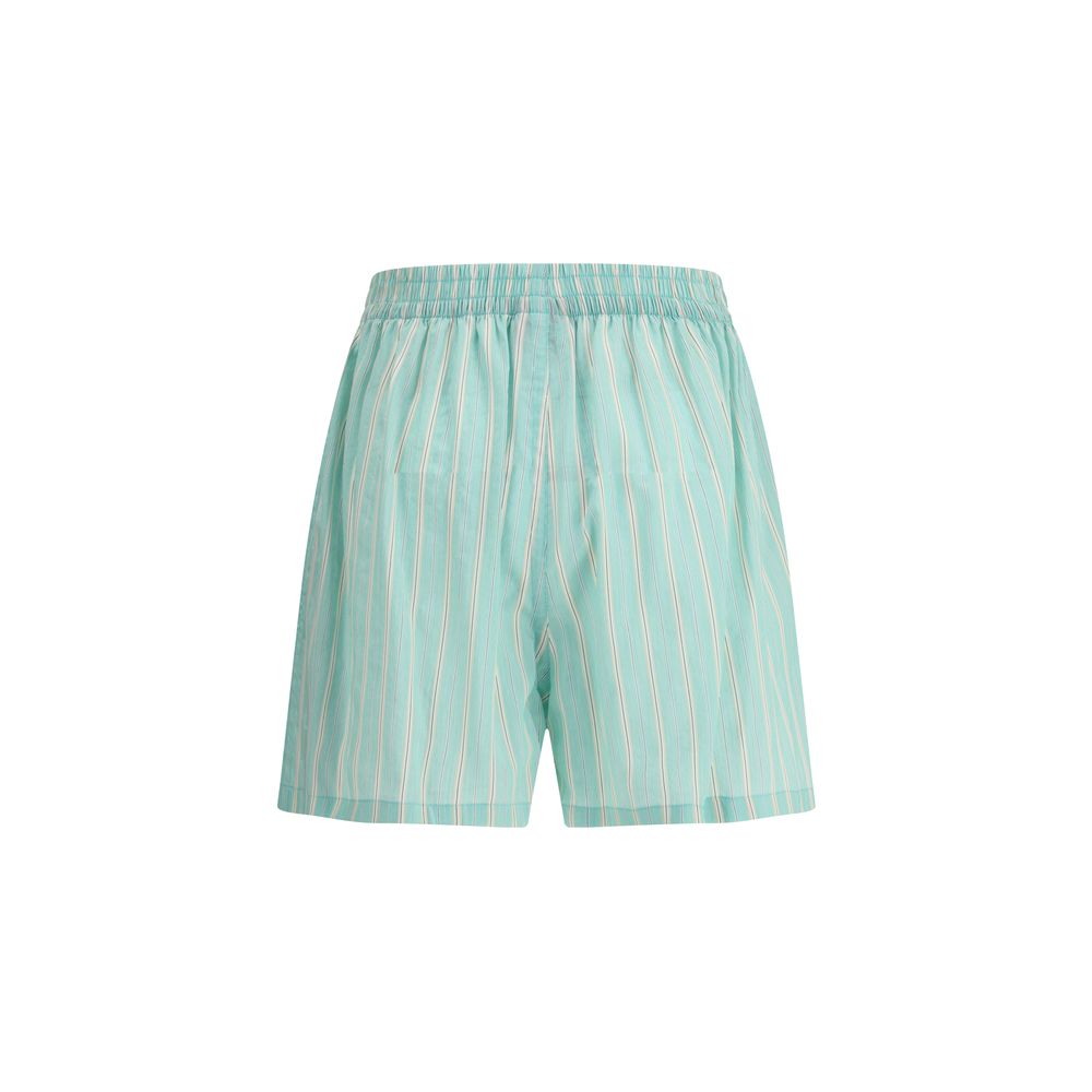 Green Copper Bermuda ShortsBalenciaga’s Striped Shorts offer the perfect balance of comfort and contemporary style. Featuring an elasticized waistband and two side welt pockets, they have an essential silhouette enhanced by a striped print for a casual ye