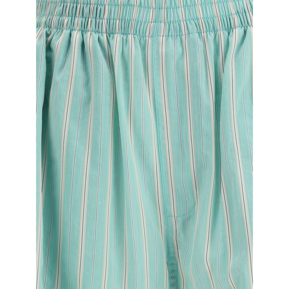 Green Copper Bermuda ShortsBalenciaga’s Striped Shorts offer the perfect balance of comfort and contemporary style. Featuring an elasticized waistband and two side welt pockets, they have an essential silhouette enhanced by a striped print for a casual ye