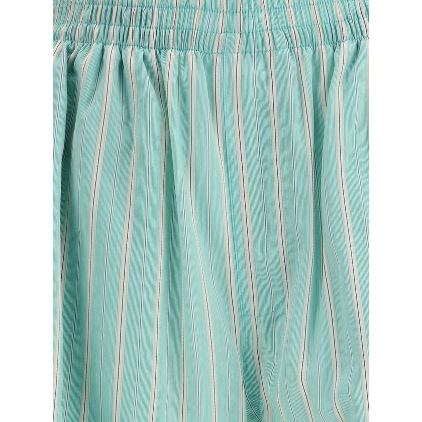Green Copper Bermuda ShortsBalenciaga’s Striped Shorts offer the perfect balance of comfort and contemporary style. Featuring an elasticized waistband and two side welt pockets, they have an essential silhouette enhanced by a striped print for a casual ye