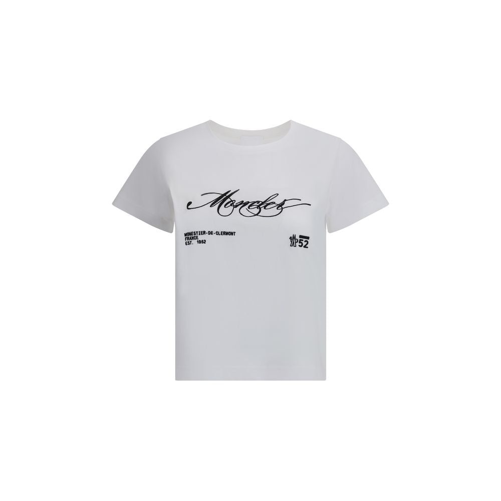 White Cotton T-ShirtMoncler’s Logo T-Shirt is a garment with an essential and modern style. Made from soft cotton, it features a ribbed crew neck and a sought-after embroidered logo on the front. The crop cut adds a contemporary touch, perfect for casual