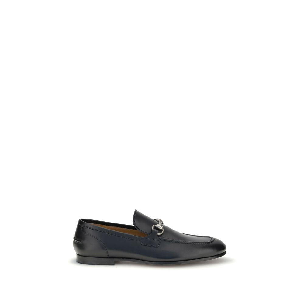 Black Calf Leather Bos Taurus Slip-On LoafersGucci’s smooth leather Jordan Loafers are a timeless classic, embellished with the iconic metallic Morsetto detail on the instep. Featuring a round toe and an elegant silhouette, they feature the logo embossed