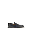 Black Calf Leather Bos Taurus Slip-On LoafersGucci’s smooth leather Jordan Loafers are a timeless classic, embellished with the iconic metallic Morsetto detail on the instep. Featuring a round toe and an elegant silhouette, they feature the logo embossed