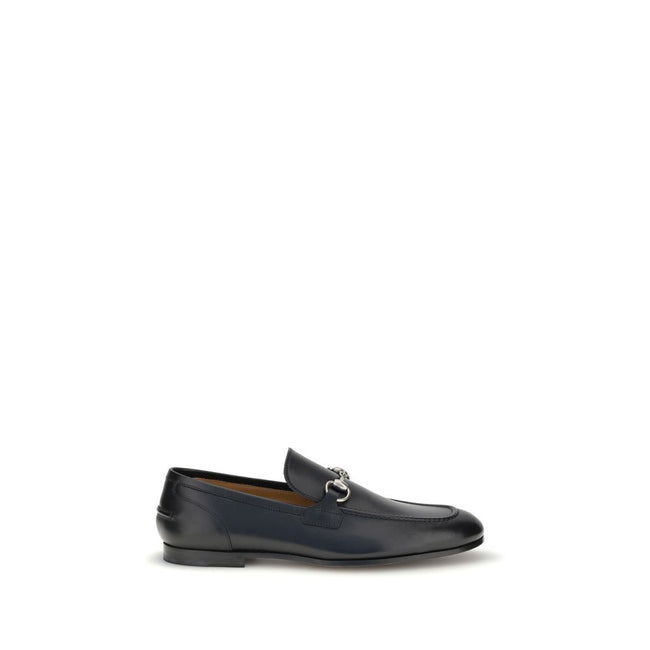 Black Calf Leather Bos Taurus Slip-On LoafersGucci’s smooth leather Jordan Loafers are a timeless classic, embellished with the iconic metallic Morsetto detail on the instep. Featuring a round toe and an elegant silhouette, they feature the logo embossed