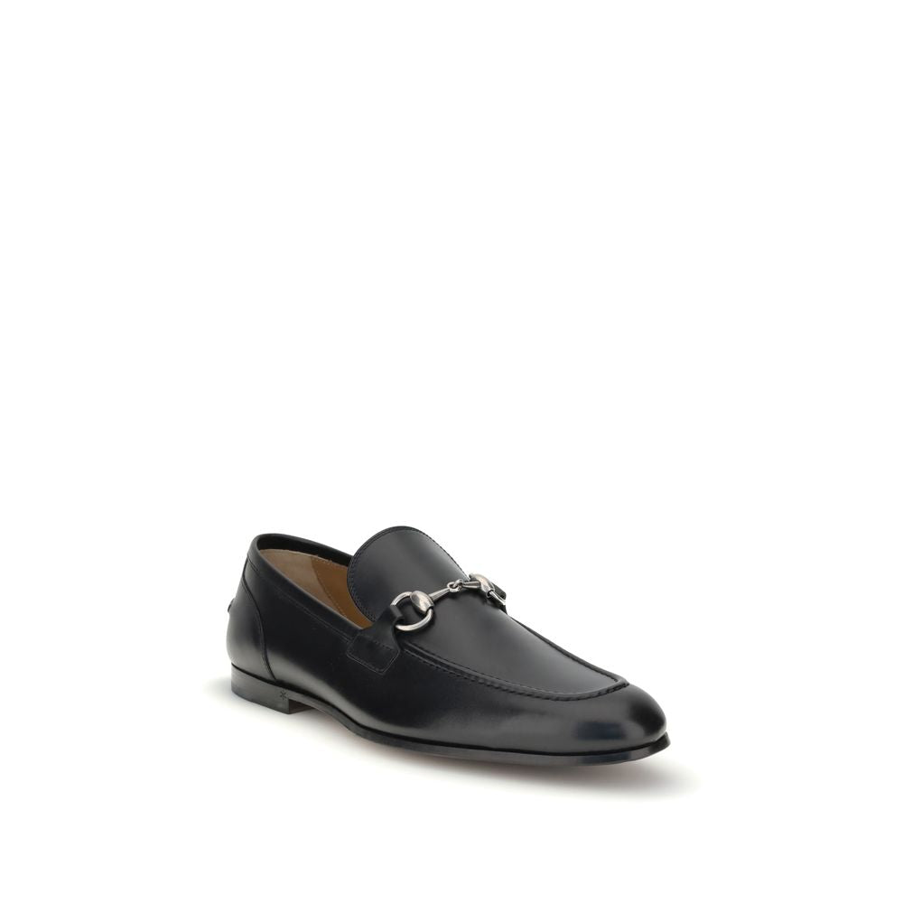Black Calf Leather Bos Taurus Slip-On LoafersGucci’s smooth leather Jordan Loafers are a timeless classic, embellished with the iconic metallic Morsetto detail on the instep. Featuring a round toe and an elegant silhouette, they feature the logo embossed