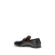 Black Calf Leather Bos Taurus Slip-On LoafersGucci’s smooth leather Jordan Loafers are a timeless classic, embellished with the iconic metallic Morsetto detail on the instep. Featuring a round toe and an elegant silhouette, they feature the logo embossed