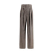 Wool Herringbone pattern wide leg PantsSaint Laurent’s wool Herringbone pattern wide leg Pants are an example of impeccable tailoring and timeless style. Featuring a medium waist and wide leg, they feature double pleats and a center crease that define an