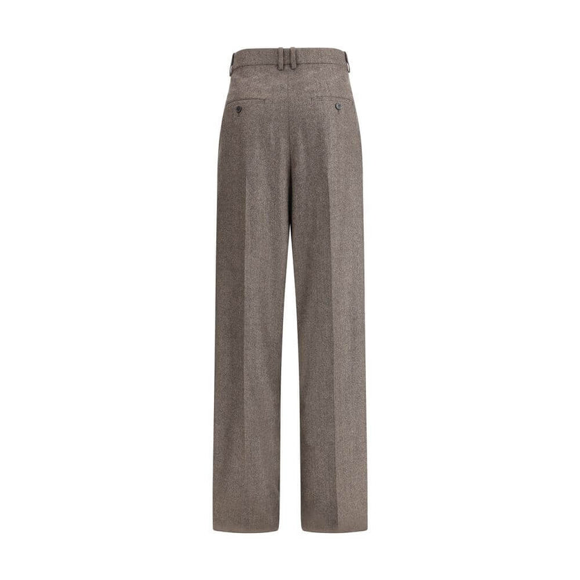 Wool Herringbone pattern wide leg PantsSaint Laurent’s wool Herringbone pattern wide leg Pants are an example of impeccable tailoring and timeless style. Featuring a medium waist and wide leg, they feature double pleats and a center crease that define an