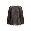 Striped sequined BlouseMissoni’s Striped sequined Blouse is a feminine and sophisticated piece, featuring a simple crew neck and balloon sleeves that give it volume and movement. The raw-cut hem adds a modern detail, while sequins embellish the striped pa