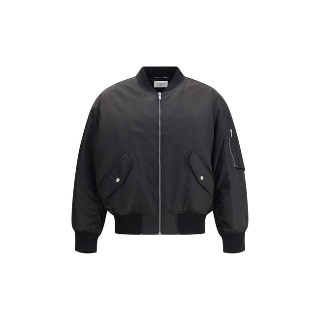 Black Polyamide BomberSaint Laurent’s oversized bomber Jacket is made of water-repellent recycled polyamide, perfect for an urban and functional look. Featuring a front zipper closure, it has two slanted flap and snap pockets, a zippered sleeve pocket and
