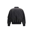 Black Polyamide BomberSaint Laurent’s oversized bomber Jacket is made of water-repellent recycled polyamide, perfect for an urban and functional look. Featuring a front zipper closure, it has two slanted flap and snap pockets, a zippered sleeve pocket and